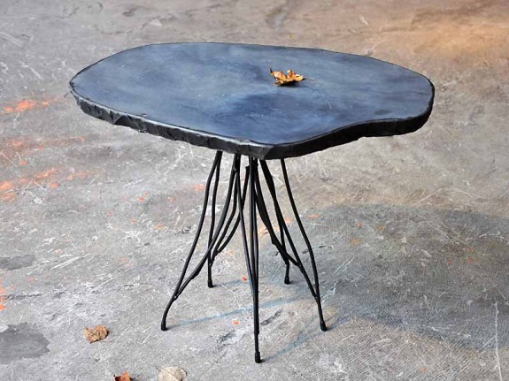 side table made of natural stone and steel